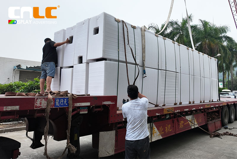 CNLC Factory Workers Preparing LED Billboards for Export